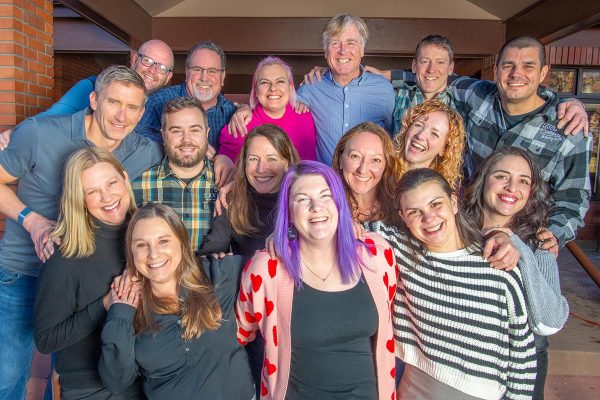 Smiling group of 16 board of directors of the brewers association