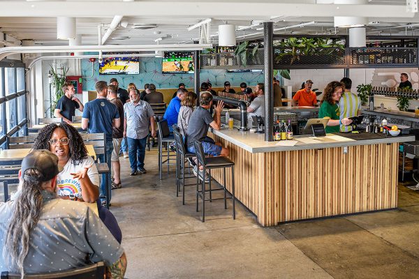 beer drinkers enjoying brewery taproom