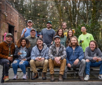 brewery team posed together