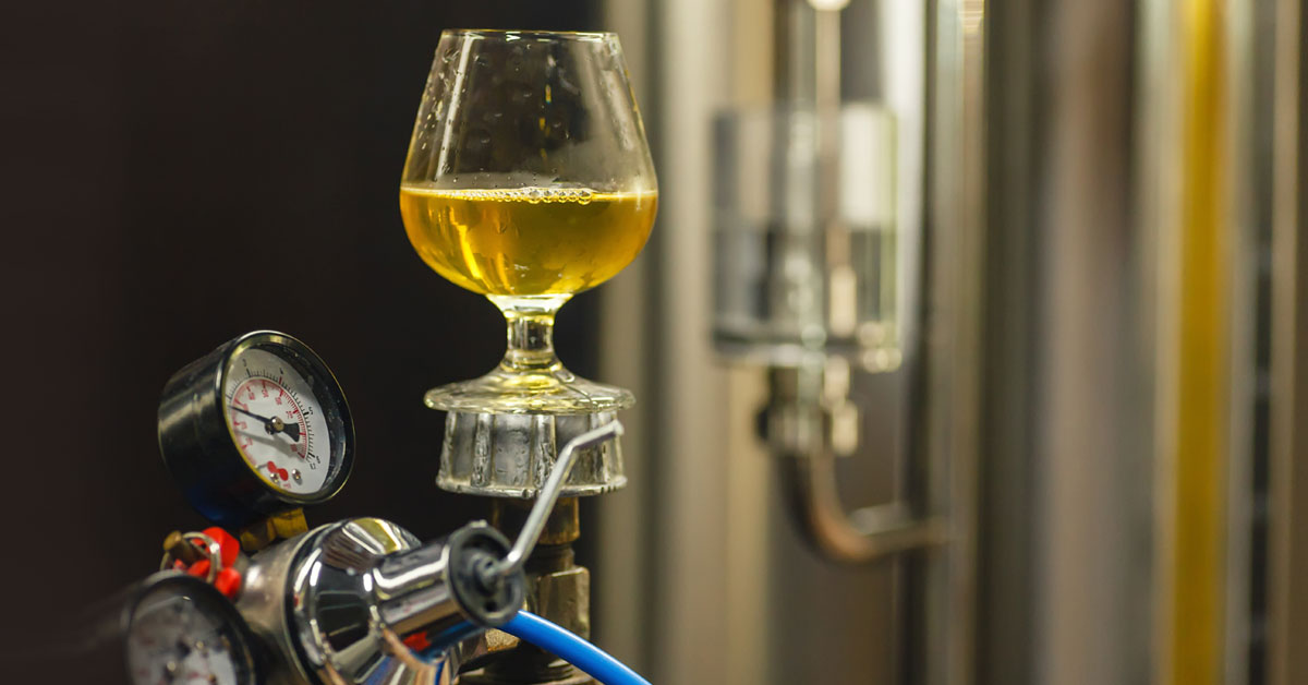 CO2 in brewery with beer in glass 1200x628 1