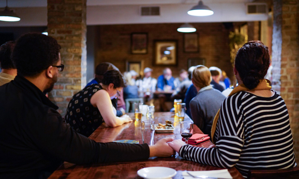 couple enjoying beer dinner