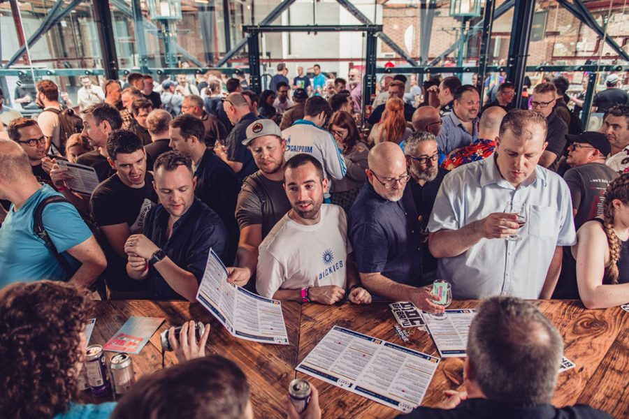 crowd of craft beer enthusiasts at london beer event