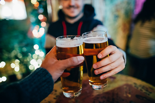 two people cheersing