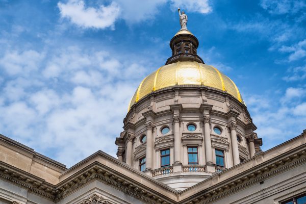 state capitol building with gold dome