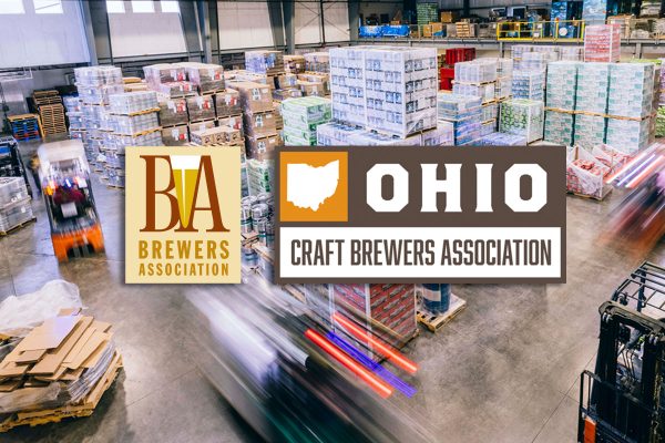 warehouse of packaged beer and kegs with brewers association and ohio craft brewers association logos