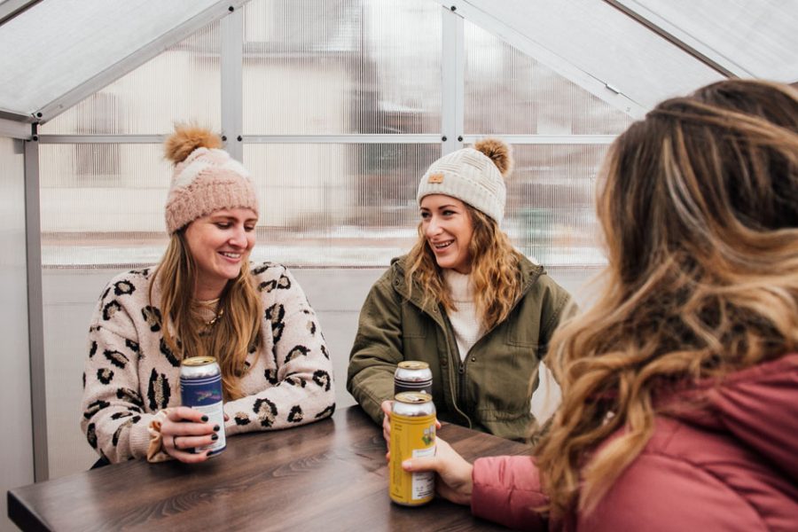 women enjoying beers in winter taproom space x