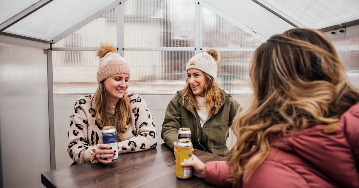 women enjoying beers in winter taproom space x